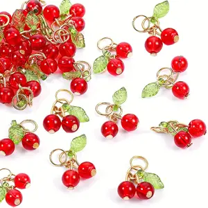 Lustrous Cherry-Hued Glass Beads (47 Pcs) - Fancy Beads Supplies with Golden Capsule Caps, Green Leaf Pendants, Spherical Fruit Decor for DIY Earrings, Necklaces