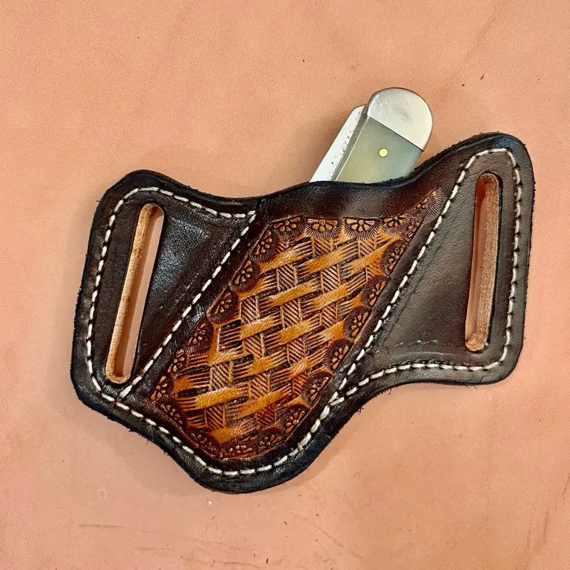 Hand tooled trapper leather sheath Hand tooled trapper leather sheath