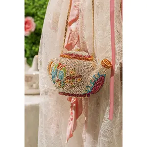 WHATS THE TEA BLING PURSE