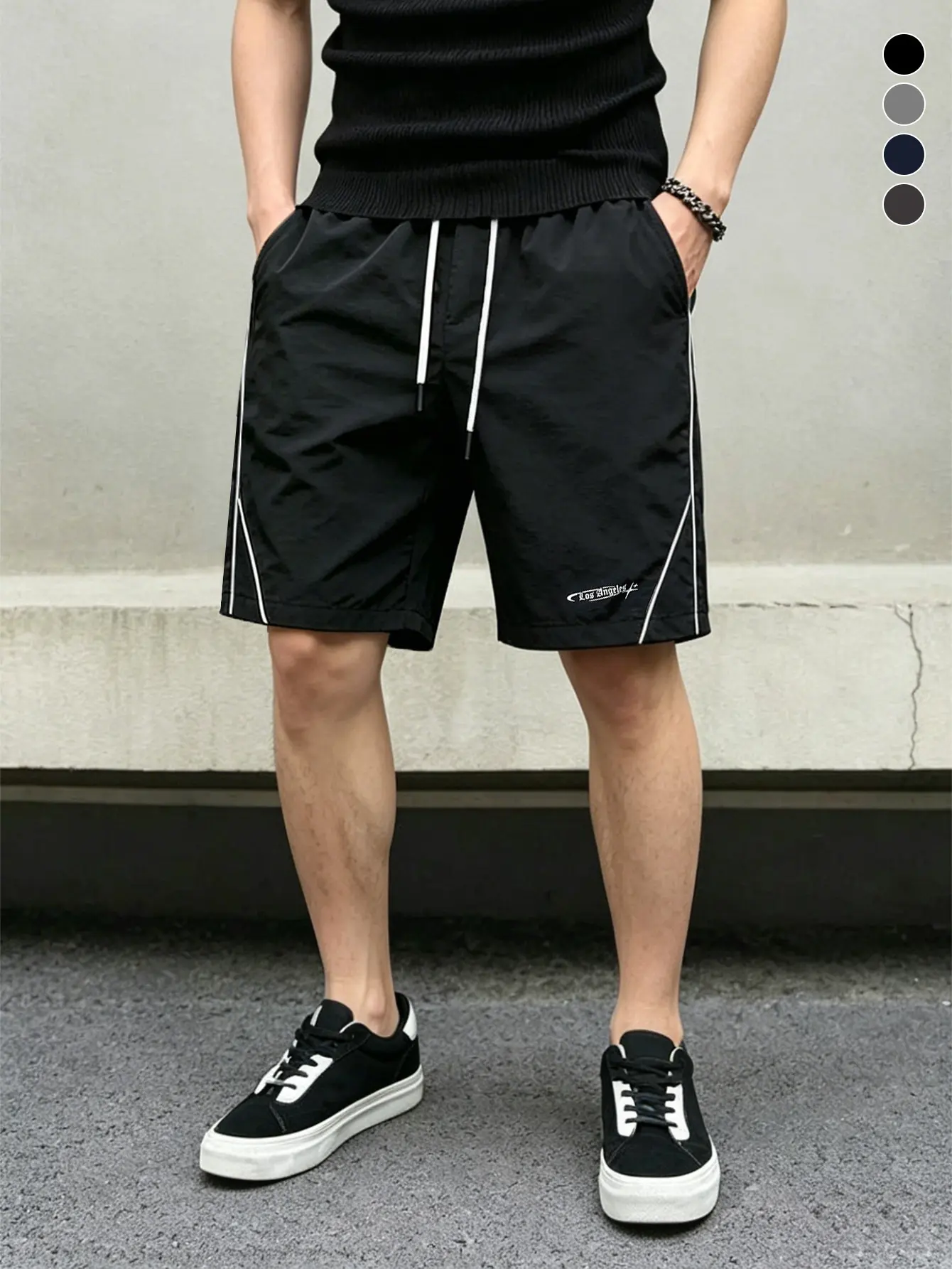 Men’s summer black athletic shorts with white stripes and letter print, drawstring elastic waistband, street-style casual shorts for everyday sports, versatile.