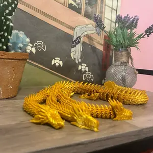 yellow three-headed 3d printed dragon collectible