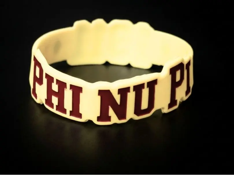 Krimson and Kream Phi Nu Pi Rubber Slap Band Bracelet - Cream Color with Maroon Letters, Textured Matte Finish, Adjustable Fit for Daily Wear
