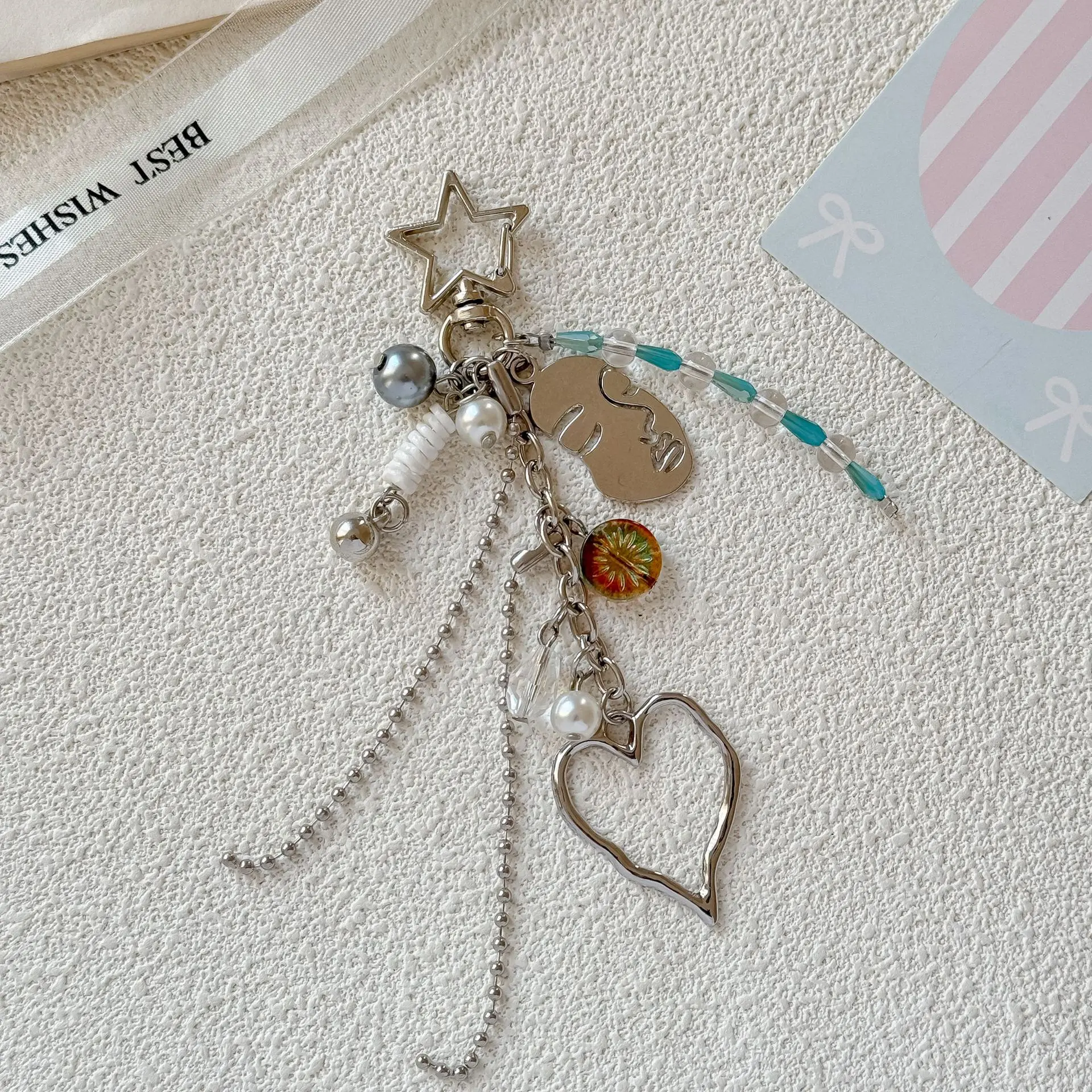 Abstract Face Keychain Bag Charm, Silver Wavy Hollow Heart Pendant, Layered Blue Bead Pearl Tassel Clip On Ornament, Minimalist Y2K Aesthetic Accessory For Backpack Purse Airpods Case