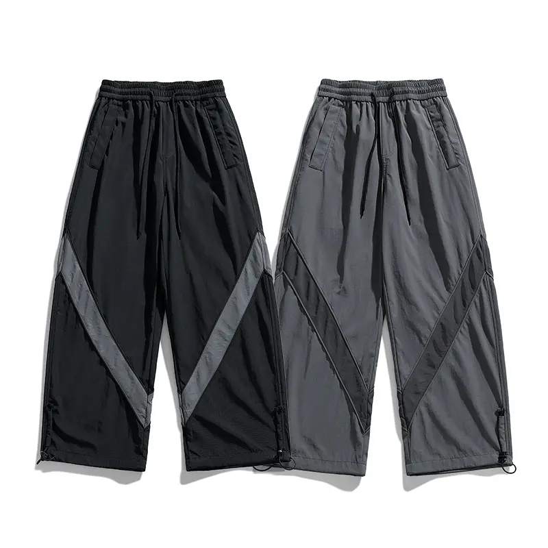 Men's color blocked parachute pants, wide leg Techwear workwear pants, Gorpcore practical pants, adjustable cuff hiking and jogging pants, loose streetwear pants，Y2K Baggy Style, Dark Minimal Utility, Skate Street Fashion, Mountain Outdoor Bottoms,