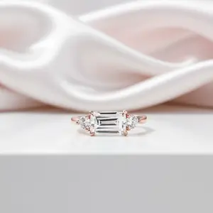 2.5 Carat Emerald Cut Three Stone Engagement Ring