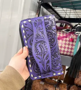 Genuine hand tooled leather accordian style clutch wallet