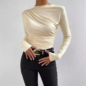 Women's solid color slim-fit base layer top with pleats