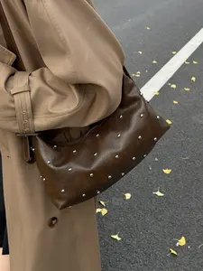 Classic retro style exquisite texture fashionable rivet underarm bag, crescent shaped design, zipper opening and closing, large capacity interior, suitable for daily commuting, shopping, and gatherings, Casual Commuter Bag