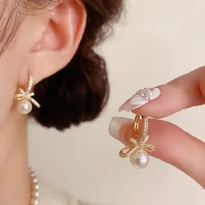 Micro-inlaid zircon bow pearl earrings DDES0455, exquisite, fashionable, light luxury, versatile, high-end, ultra-shiny earrings, 14K gold-plated