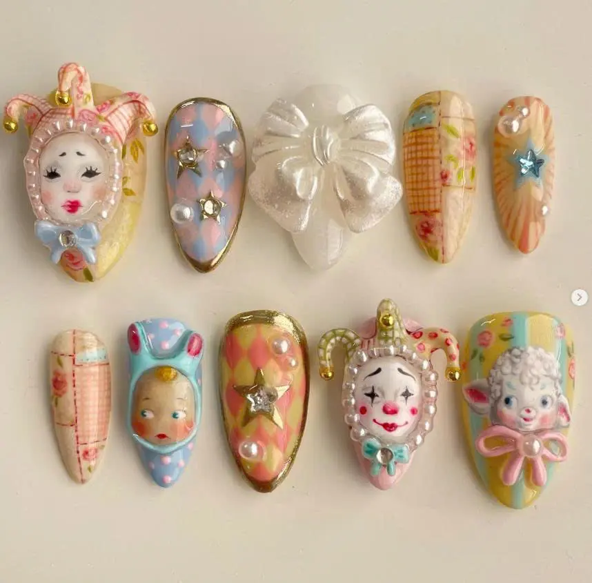 Whimsical vintage-inspired 3D nail art with clowns, bows, stars, and pastel patchwork patterns, perfect for a playful, nostalgic, and artistic statement look.