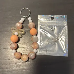 Keychain with phone lanyard tab Keychain with phone lanyard tab