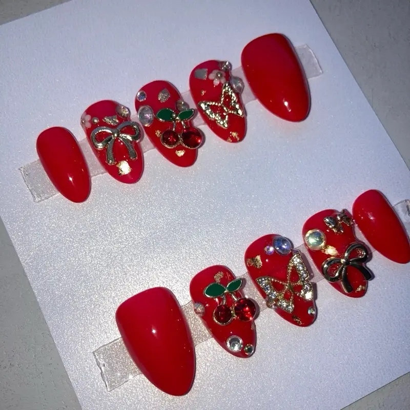 Extra Short Almond Gorgeous Red Press On Junk Nails with Decorative Elements and Bow Designs