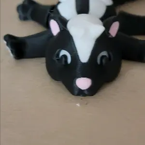 SKUNKS! Articulated skunk figurines