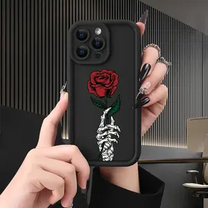 Black Phone Cover Designed for Iphone Models 16 Pro Max, 15 Plus, 14, 13, 12, 11, XR, And XS Featuring a Skull And Rose Design, Made from Anti-Scratch And Shockproof TPU Material for Drop Protection.