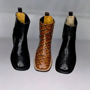 BOTINES ARTESANALES Premium Short Boots  Material & Design: These short boots are crafted from cow hide, featuring a grabada finish. They are designed with a square toe and a mid-calf height, providing a stylish and comfortable fit.  Functionality: