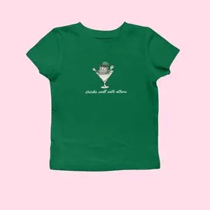 St Patrick's Day Baby Tee for Women, Leprechaun Martini Cocktail Drinks Well With Others Baby Tee St Patty Day Shirt Funny St Paddy Tee