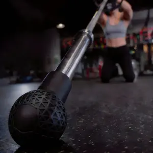 Barbell landing training device with 360° rotating base, fits 2-inch Olympic barbells, ideal for home gym fitness equipment