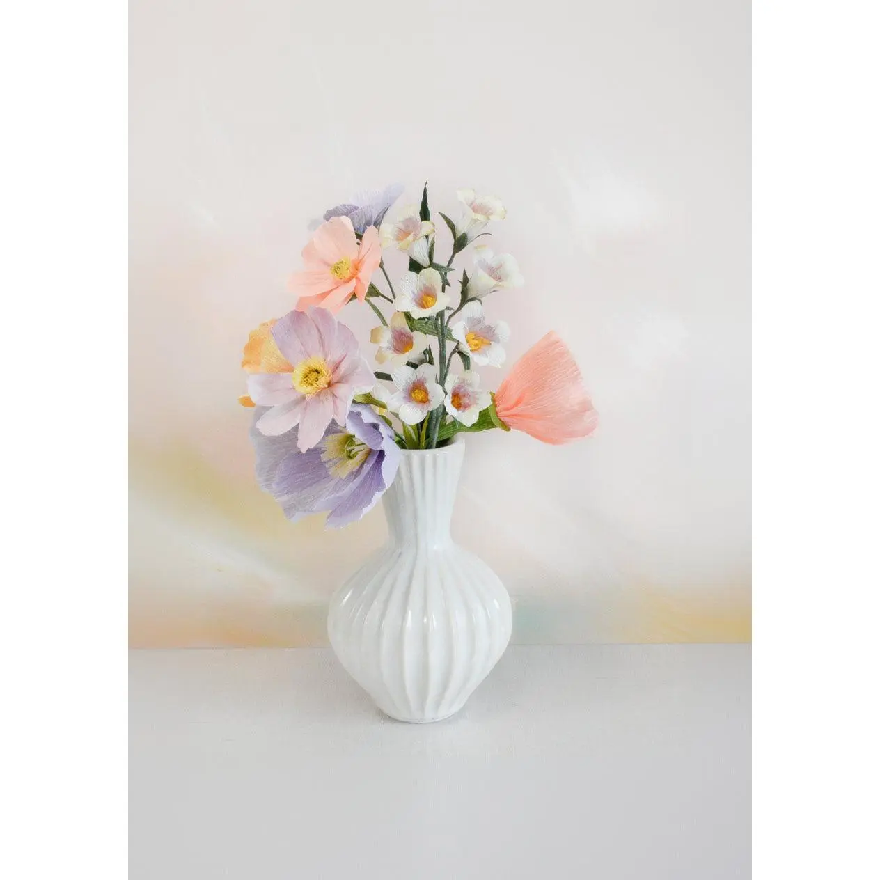Limited Release Icelandic Poppy, Cosmos, and Lily of the Valley Bouquet