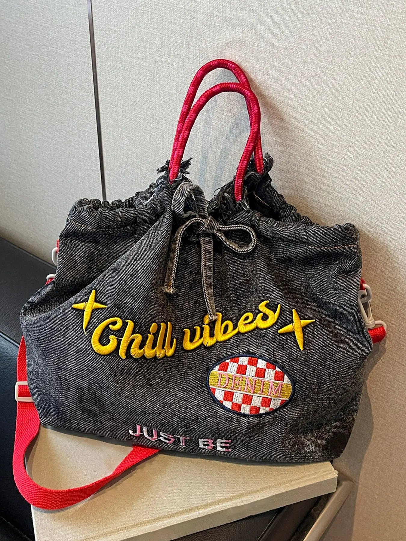 Retro denim drawstring tote bag, contrasting red shoulder strap, embroidered letter trendy handbag, versatile with large capacity, Stylish Work Bag, Casual commuter bag, Casual Everyday Bag, suitable for students, office workers