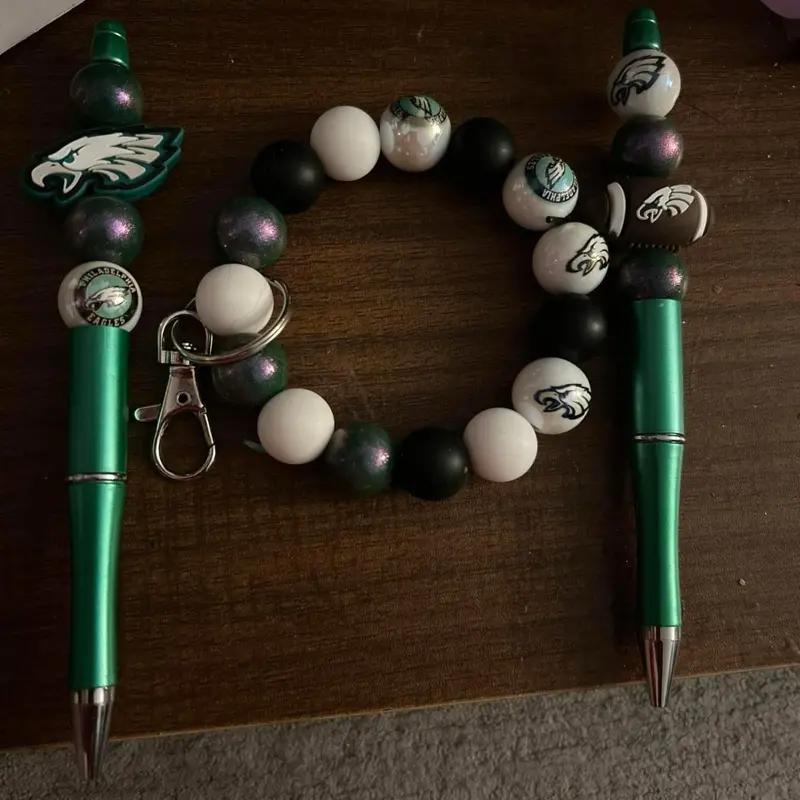 Eagles Silence green and white beads and  Eagles Forces on the pens andEagles wristlet keychain