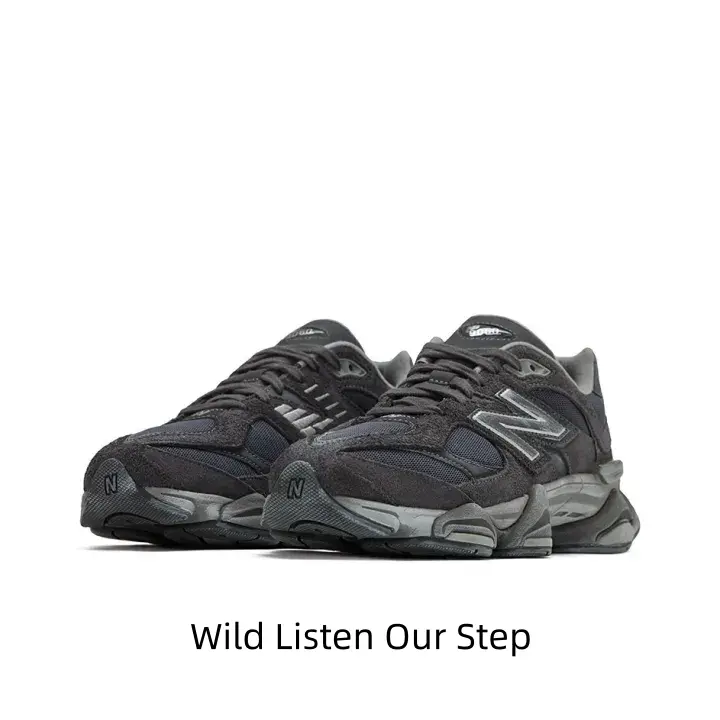 Structured chunky retro dad sneakers. Tactile charcoal black suede matched with navy mesh, creating cool dark minimalist casual sneaker aesthetics.