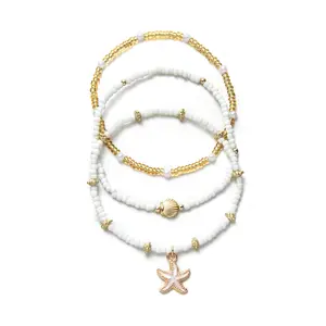 Three-piece Bohemian bead bracelet set, featuring summer marine elements like starfish and seashell imitation pearl pendants, is ideal for ladies to wear at daily parties and beach vacations