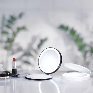 Swedish LED Lighted Magnifying Make-Up Mirror Compact - Matte Black Case, 4.75" Diameter, USB Charging Cord Included, Normal & 7x Magnification