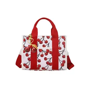 Personalized and trendy exquisite women's crossbody bag shoulder bag, simple and niche, Fashionable patterned bag, cherry patterned women's bag with design sense, with cherry pendant, suitable for daily occasions such as commuting, shopping, parties