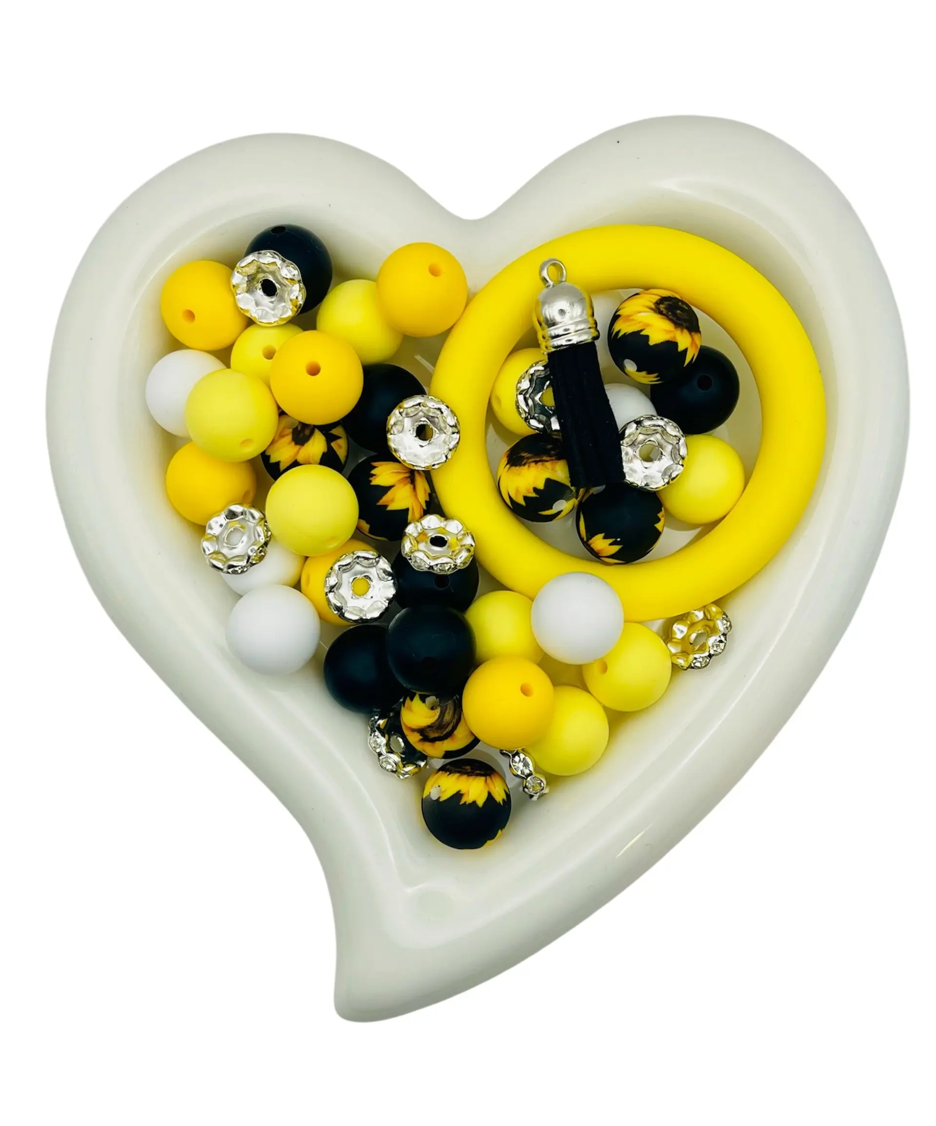 Silicone Kit features vibrant silicone beads paired with fun patterned accents for a wild, eye-catching look. Perfect for creating keychains, bracelets, and beadable accessories