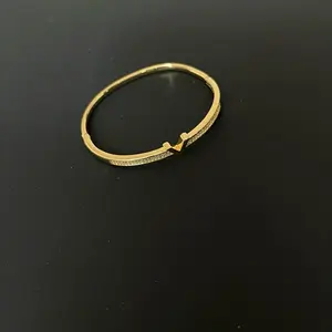 Vela Stainless Steel Bangle Bracelet with Cubic Zirconia Elegant Design and Sparkling Stones