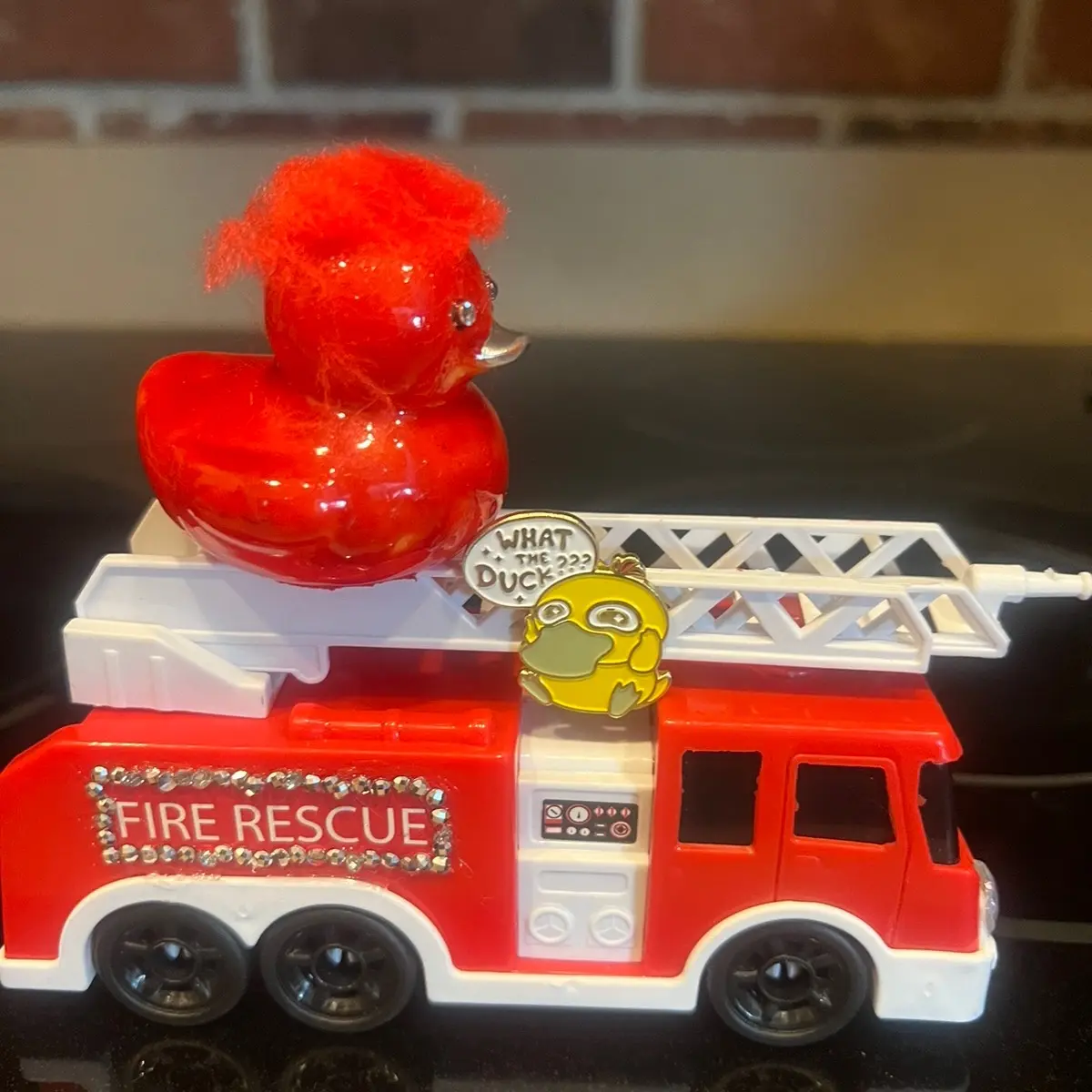 Red and silver rubber duck