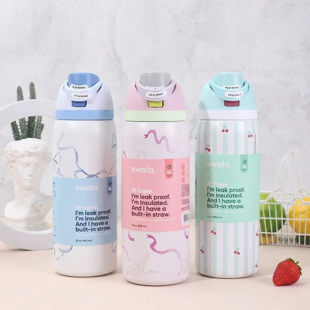 32Oz Special Edition Owala FreeSip Insulated Stainless Steel Water Bottle with Straw for Sports and Travel, Leak Proof, BPA-Free, Blue Bow, Pillow Fight, Pink Bow