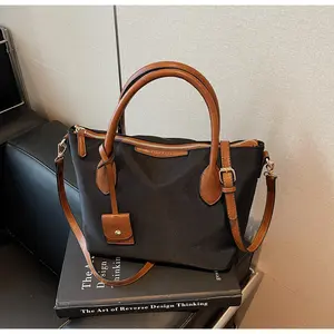 Lightweight casual handbag; women’s large-capacity nylon water-resistant crossbody bag; classic tote/dumpling bag; multifunctional business shoulder bag; suitable for work, school, travel, and holiday gifts; premium textured color-block women’s handbag.