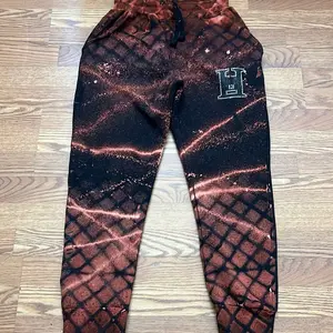 Men’s custom sweatpants with 1 of 1 design. Waffle and streetwear brand bleach design patterns.