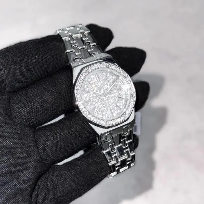 Luxury Gold Watch with Diamond Accents and Elegant Design