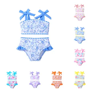 Girls' two-piece halter-neck ruffled swimsuit, floral print, beachwear.