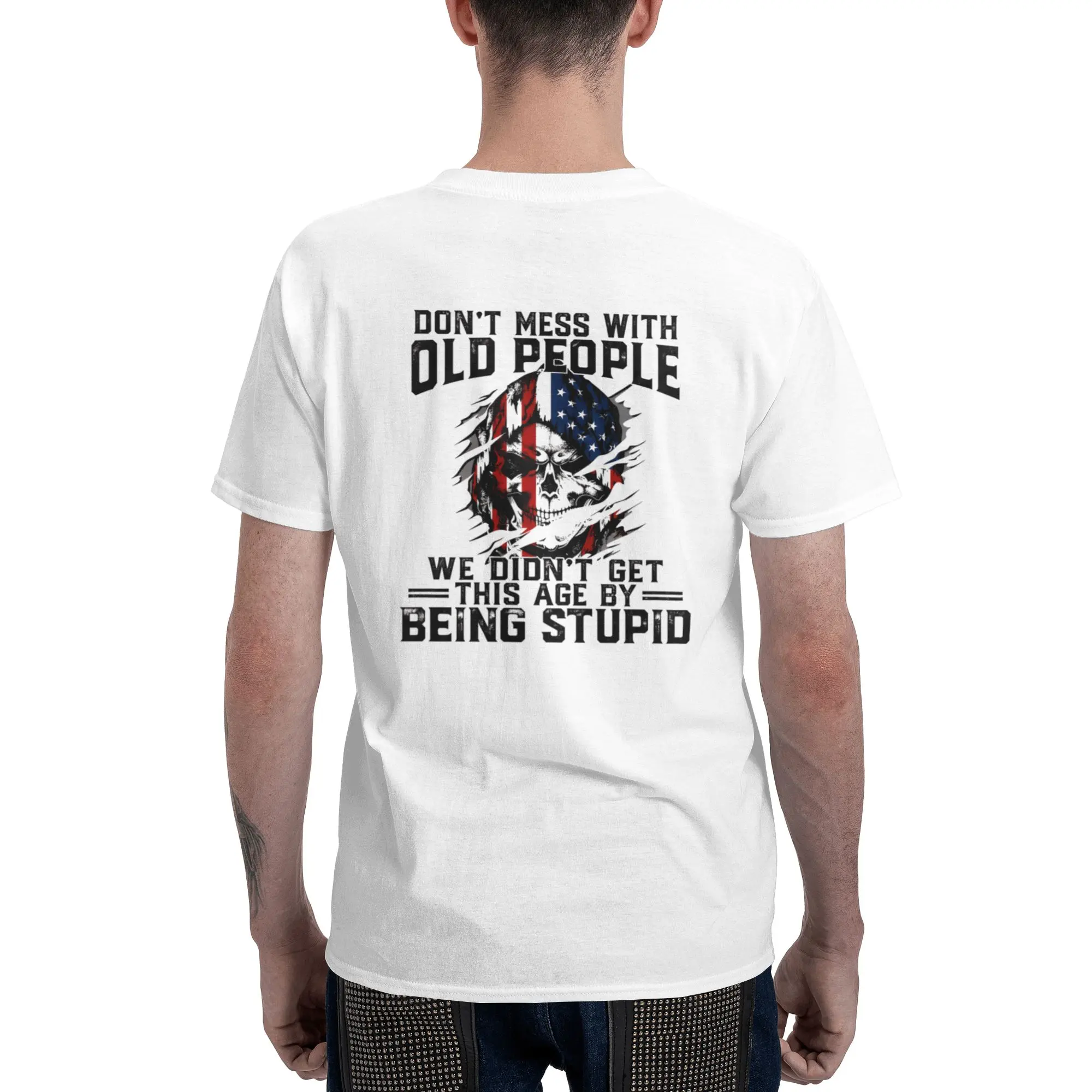 Eye‑catching white tee with striking back graphic,American flag‑styled skull paired with sharp witty text. Comfortable regular fit, bold patriotic‑themed outfit, perfect for short video clips, awesome conversation‑starter shirt for senior‑loving audiences