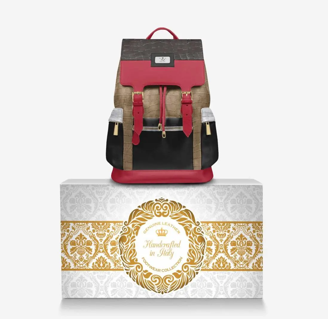 TAN BACKPACK WITH RED ACCENT