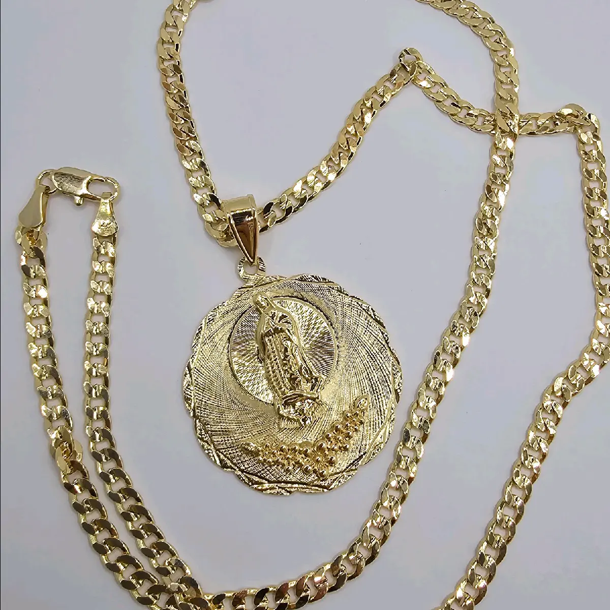 VIRGIN MARY with flowers  Cuban necklace style gold-plated beautiful design no fade no tarnish just don't take long showers with them gold over stainless