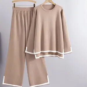 Moon loungewear set for parties. Soft, stretchy knit top and wide-leg pants. Cozy sleepwear for casual outings and relaxing at home. Solid color crew neck with patchwork design. Cardigan Pant Women's Clothes Womenswear Suits conjunto hermoso