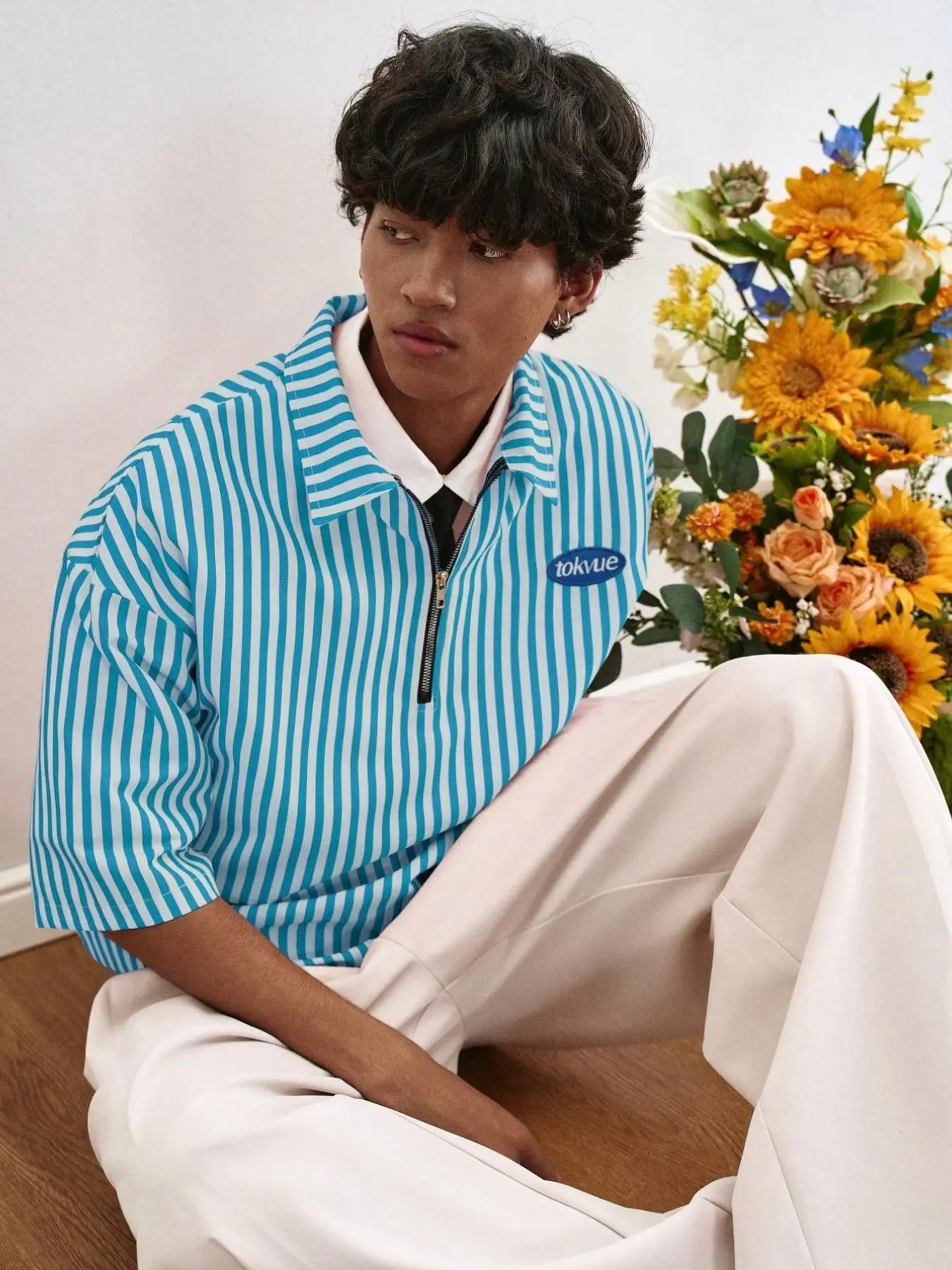 Men's and women's versions of a red-striped, semi-zip, short polo shirt, Summer Polos with a retro street style, Aesthetic, collegiate-inspired top, label design, casual and stylish shirt | everyday wear, trendy summer tops