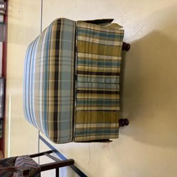 Plaid Upholstered Ottoman with Wooden Bun Feet