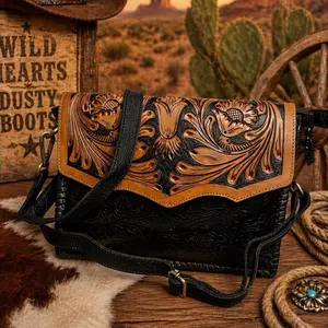 Elegant Floral Embossed Leather Crossbody Bag with Black Strap and Gold Hardware