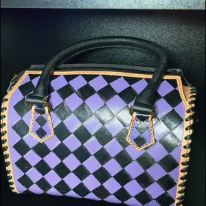 Medium purple and black checkered speedy