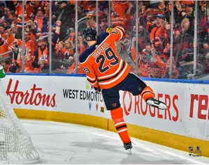 Leon Draisaitl Edmonton Oilers Unsigned Orange Jersey Goal Celebration Photograph