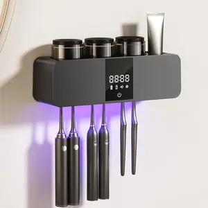 Wall-Mounted Electric Toothbrush Organizer with 3 Cups – UV Sanitizer, Toothpaste Dispenser, and Smart Bathroom Storage & Decor