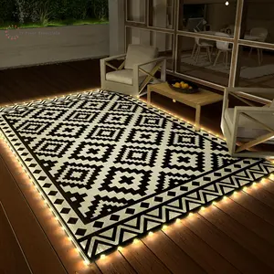 HAUSHOF 5’X8’ Outdoor Rug with LED Strip Light option, Waterproof Reversible Patio Rug with 4 Stakes for RV, Camping, Beach, Porch & Balcony, Black & White