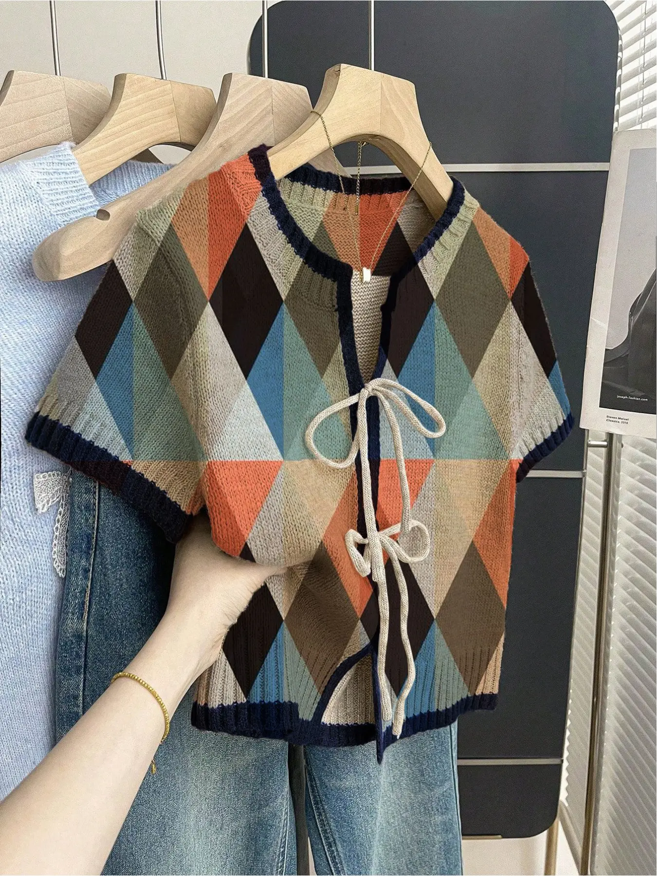Women's khaki bohemian vacation short-sleeve knit top. Loose round neck, contrast geometric print, front tie and contrast piping. Light, stylish and perfect for spring & summer casual wear. Knitwear Casual Chic Knitwear Womenswear Boho Casual Knitwear
