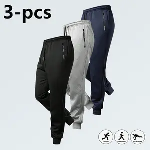 Men’s elastic-waist jogger pants with drawstring cuffs; athletic sweatpants with drawstring closure; casual jogger pants; everyday sweatpants; drawstring design; casual running/track long pants with zippered pockets.
