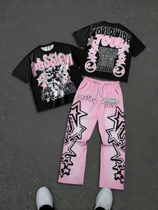 American street-style cool: a two-piece Streetwear set featuring a black-and-pink graffiti lettering and portrait print short-sleeve T-shirt and gradient-print casual pants—perfect for summer casual wear